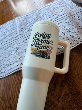 Living on Farmer Time Cream Insulated Travel Mug with Handle